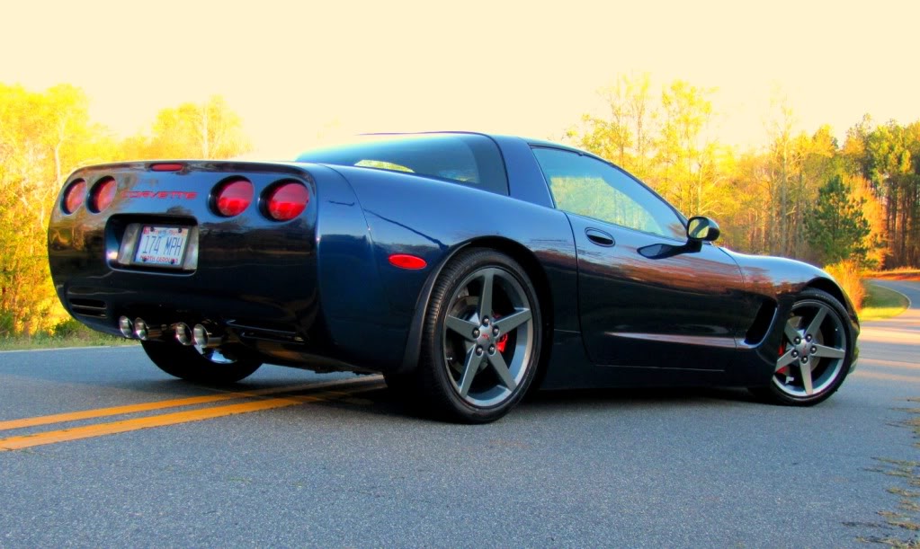C6 Z06 splash guards on the rear with 1.25 inch adapters to push the wheels out to me...