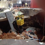 Team Shows Extreme Care in Pulling Corvettes from Sinkhole 