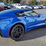 A Blue and Black (Not White and Gold) Corvette Z06 that Complements The Dress