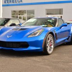 A Blue and Black (Not White and Gold) Corvette Z06 that Complements The Dress