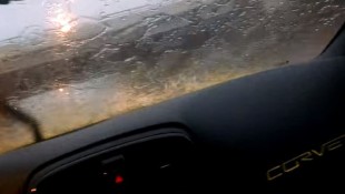 Man Cheers On His Corvette Driving Through Flood