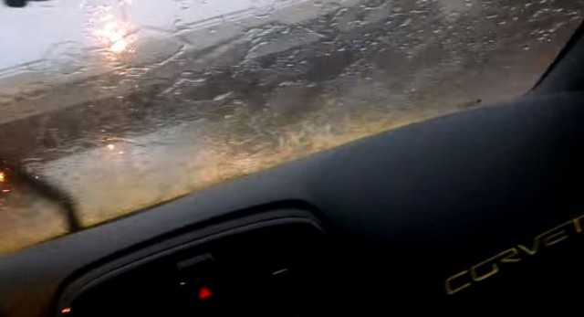 Man Cheers On His Corvette Driving Through Flood