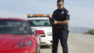 Corvette and Police Officer