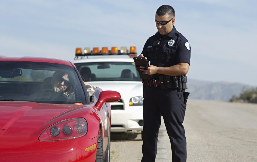 Corvette and Police Officer