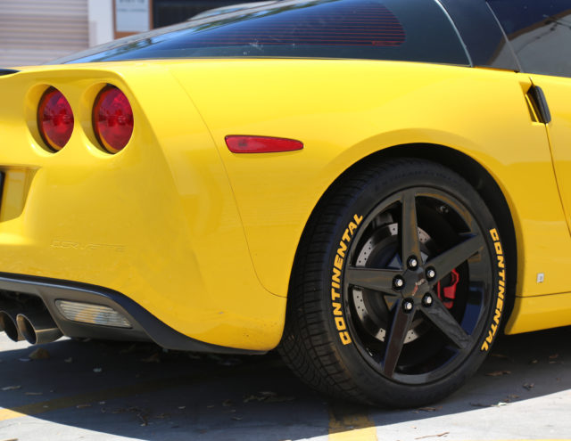 Yellow Continental Tire Stickers on C6 Corvette